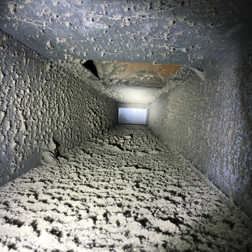 Dust buildup before air duct cleaning